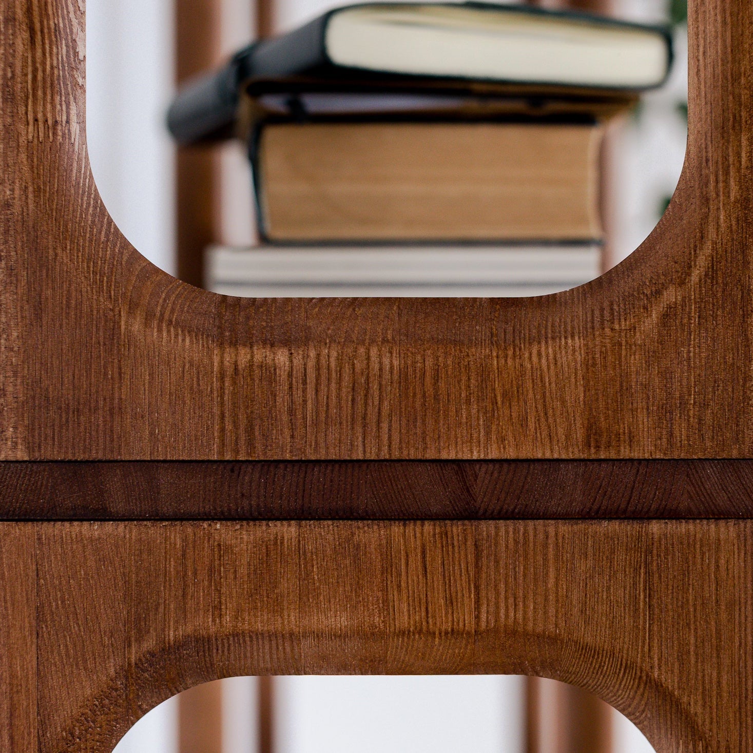Wooden chair with a shelf on a white background